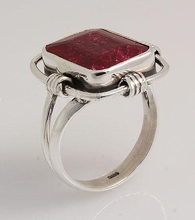 RUBY CORRUNDUM 31.16CTW UNIQUE DESIGN .925 RING: RUBY CORRUNDUM 31.16CTW UNIQUE DESIGN .925 RING **|**|** STERLING SILVER EMERALD SHAPE RING WITH 14X11MM APPROX RUBY CORRUNDUM GEMSTONE ; MSRP: $100