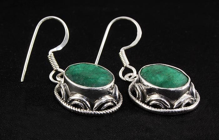 EMERALD BERYL 39.41CTW SILVER HOOK EARRING: EMERALD BERYL 39.41CTW SILVER HOOK EARRING **|**|** STERLING SILVER OVAL EARRING WITH 12X10MM APPROX EMERALD BERYL GEMSTONE ; MSRP: $200