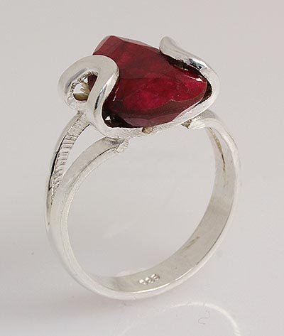RUBY CORRUNDUM 18.03CTW UNIQUE DESIGN .925 RING: RUBY CORRUNDUM 18.03CTW UNIQUE DESIGN .925 RING **|**|** STERLING SILVER PEAR RING WITH 15X9MM APPROX RUBY CORRUNDUM GEMSTONE ; MSRP: $100