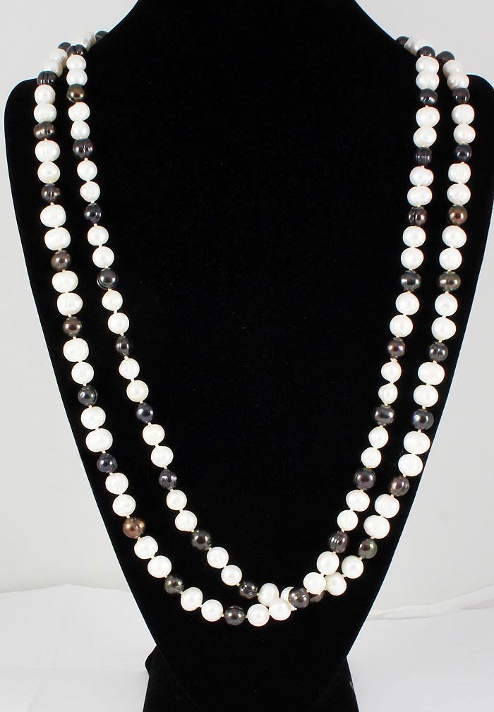 885.00CTW Black&White Freshwater Pearl Necklace: 885.00CTW Black&White Freshwater Pearl Necklace **|**|** 31 inches Long Strand Black and White Freshwater Pearl Necklace; Size: 10mm ; MSRP: $600