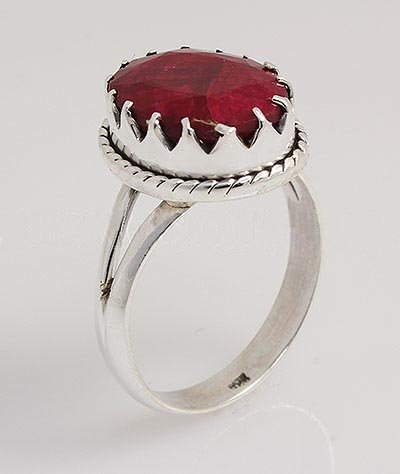 RUBY CORRUNDUM 26.90CTW UNIQUE DESIGN .925 RING: RUBY CORRUNDUM 26.90CTW UNIQUE DESIGN .925 RING **|**|** STERLING SILVER OVAL RING WITH 13X11MM APPROX RUBY CORRUNDUM GEMSTONE ; MSRP: $200