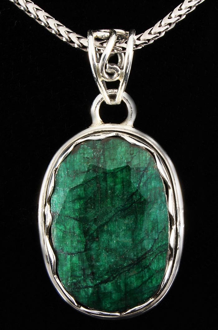NATURAL EMERALD BERYL 42.85CTW SILVER PENDANT: NATURAL EMERALD BERYL 42.85CTW SILVER PENDANT **|**|** STERLING SILVER OVAL PENDANT WITH 22X15MM APPROX EMERALD BERYL GEMSTONE ; MSRP: $200
