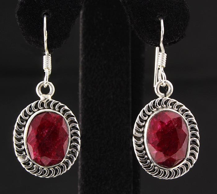 RUBY CORRUNDUM 35.47CTW SILVER HOOK EARRING: STERLING SILVER OVAL EARRING WITH 12X9MM APPROX RUBY CORRUNDUM GEMSTONE