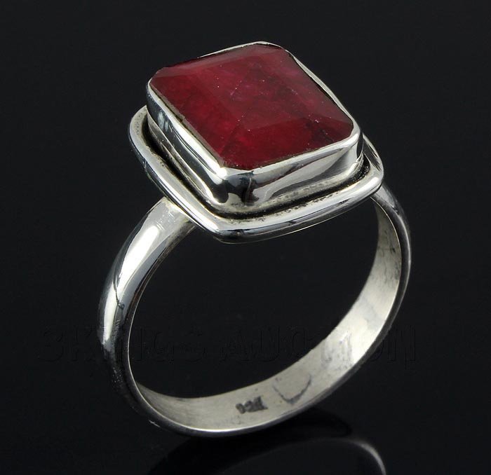 RUBY CORRUNDUM 26.81CTW STERLING SILVER RING: 12.83X10.15MM EMERALD SHAPE RUBY CORRUNDUM SILVER RING; SIZE 8