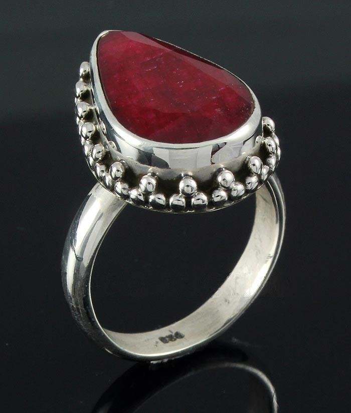 RUBY CORRUNDUM 26.94CTW STERLING SILVER RING: 16.85X10.86MM PEAR SHAPE RUBY CORRUNDUM SILVER RING; SIZE 5