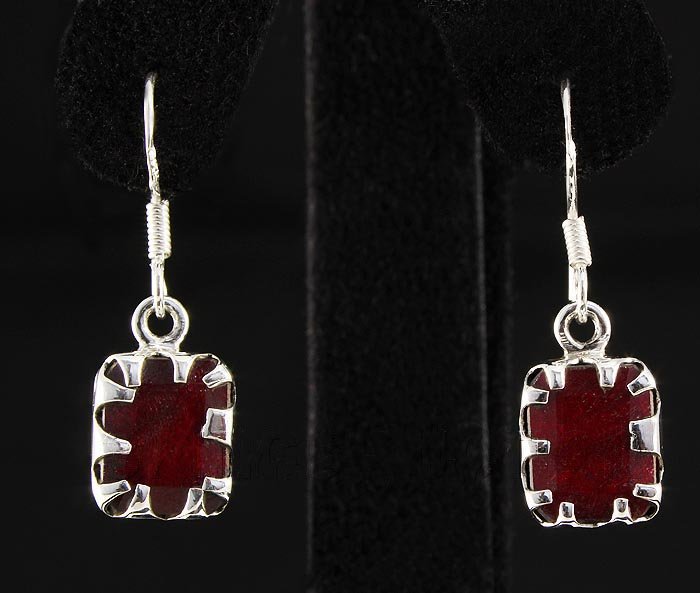 RUBY CORRUNDUM 16.70CTW SILVER HOOK EARRING: RUBY CORRUNDUM 16.70CTW SILVER HOOK EARRING **|**|** STERLING SILVER EMERALD SHAPE EARRING WITH 10X7MM APPROX RUBY CORRUNDUM GEMSTONE ; MSRP: $100