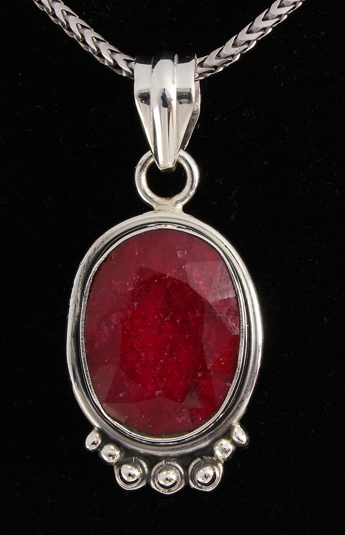 RUBY CORRUNDUM 33.23CTW STERLING SILVER PENDANT: 18X14MM OVAL SHAPE RUBY CORRUNDUM BEZEL TYPE SILVER PENDANT