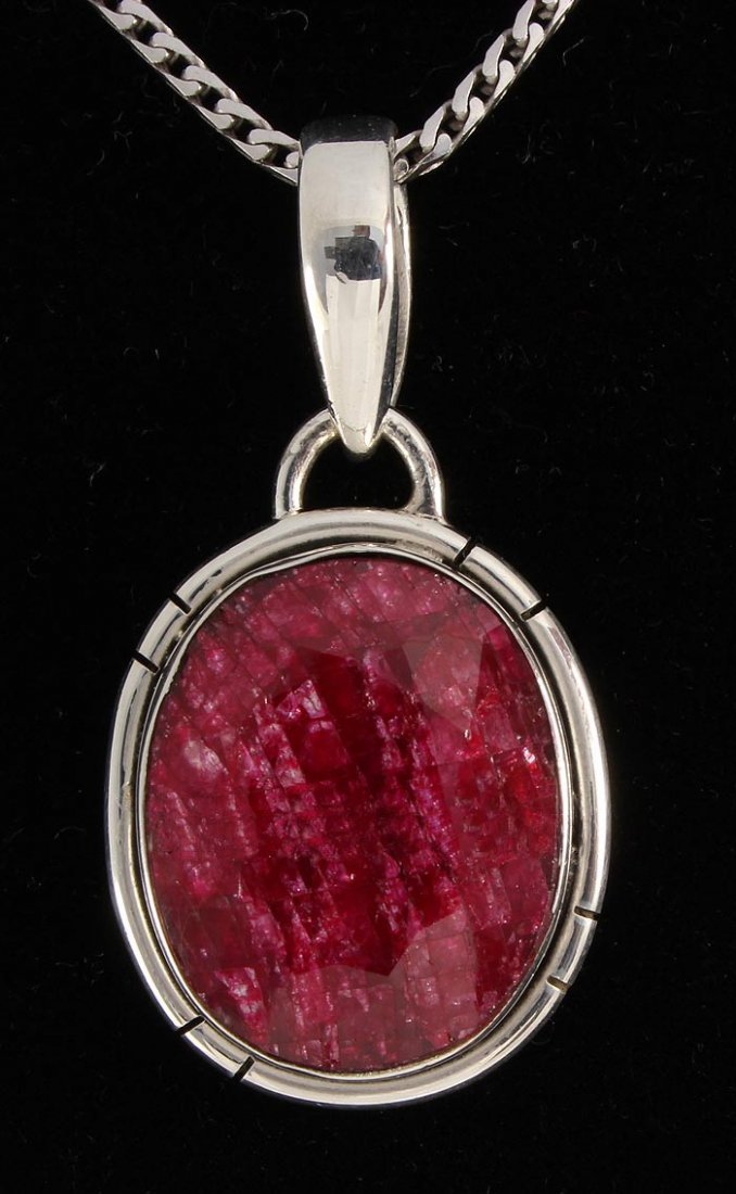 RUBY CORRUNDUM 29.11CTW STERLING SILVER PENDANT: RUBY CORRUNDUM 29.11CTW STERLING SILVER PENDANT **|**|** 18X15MM OVAL SHAPE RUBY CORRUNDUM BEZEL TYPE SILVER PENDANT ; MSRP: $300