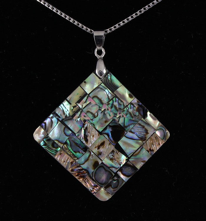 Natural 48.97ctw Mother Of Pearl Silver Pendant: Natural 48.97ctw Mother Of Pearl Silver Pendant **|**|** 34.40x34.74 mm Like Glass Fill Moonstone Rainbow Color Mother of Pearl Sterling Silver Pendant ; MSRP: $300