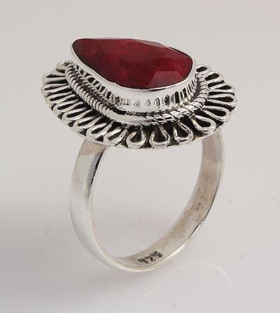 RUBY CORRUNDUM 27.00CTW ANTIQUE LOOKS .925 RING: RUBY CORRUNDUM 27.00CTW ANTIQUE LOOKS .925 RING **|**|** STERLING PEAR RING WITH 15X8MM APPROX RUBY CORRUNDUM GEMSTONE ; MSRP: $200