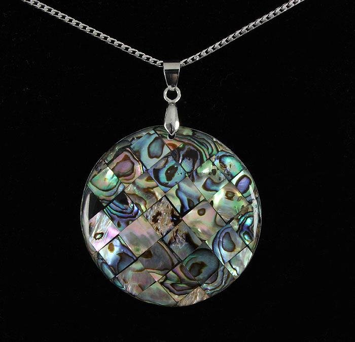 Natural 51.00ctw Mother Of Pearl Silver Pendant: Natural 51.00ctw Mother Of Pearl Silver Pendant **|**|** 40.20x40.20mm Like Glass Fill Moonstone Rainbow Color Mother of Pearl Sterling Silver Pendant ; MSRP: $300
