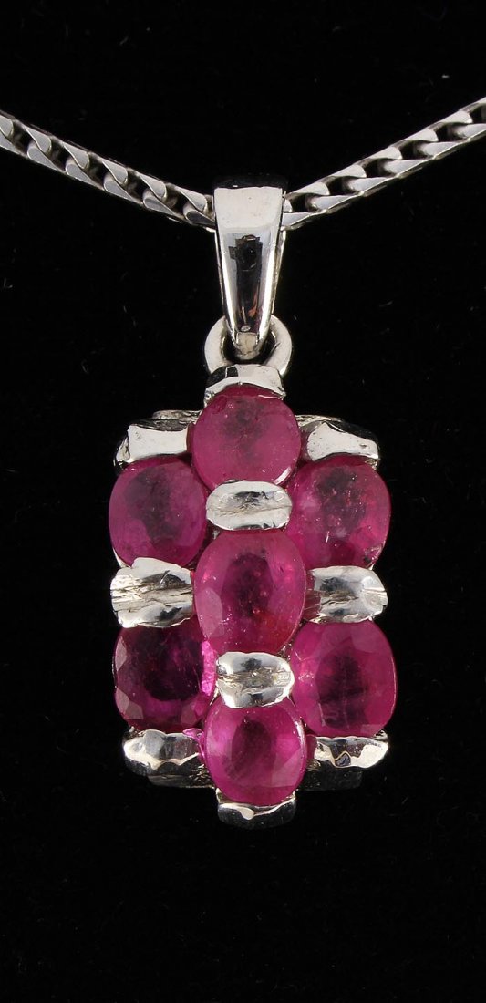 3.50ctw Pink Ruby Sterling Silver Cluster Pendant 2.35g: 3.50ctw Pink Ruby Sterling Silver Cluster Pendant 2.35g **|**|** Natural Ruby Corrundum Gesmtone 7pcs Oval 5x4mm in Silver Pendant; Size: 1.05x0.43 inches ; MSRP: $100