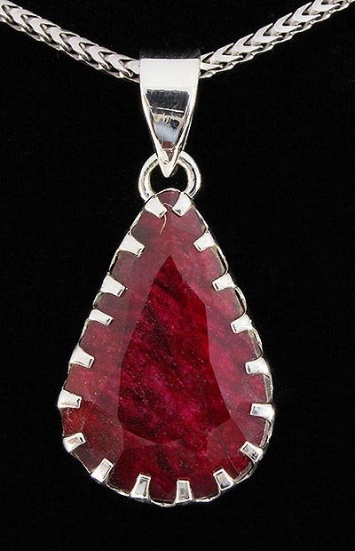 RUBY CORRUNDUM 29.20CTW SILVER PENDANT: RUBY CORRUNDUM 29.20CTW SILVER PENDANT **|**|** STERLING SILVER PEAR PENDANT WITH 22X14MM APPROX RUBY CORRUNDUM GEMSTONE ; MSRP: $100
