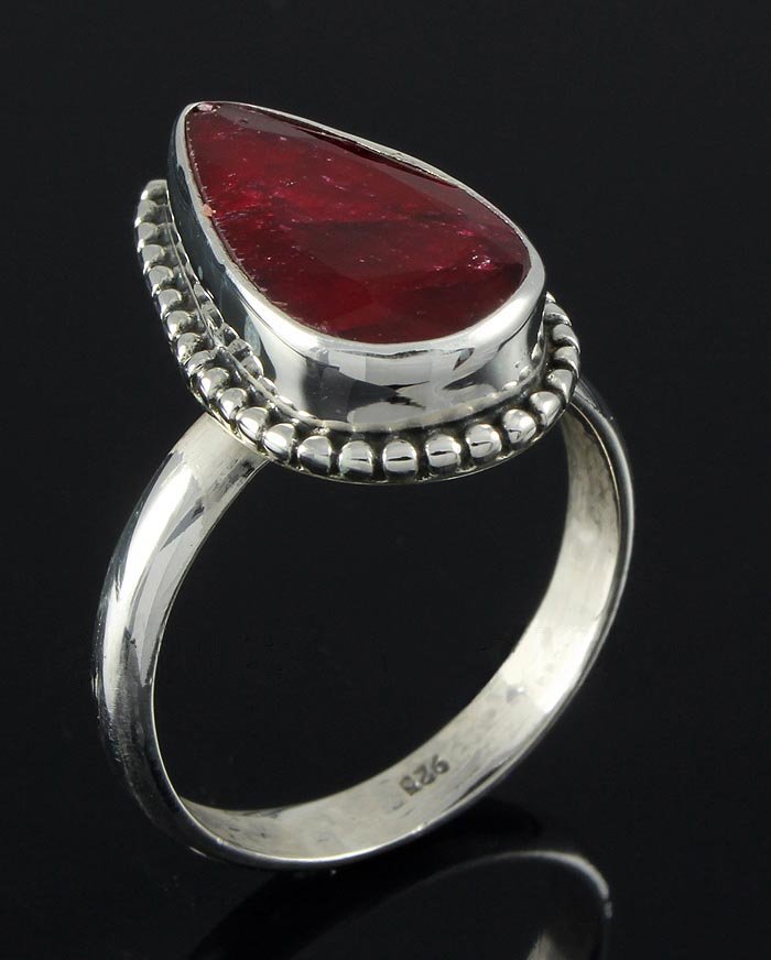 RUBY CORRUNDUM 26.60CTW STERLING SILVER RING: RUBY CORRUNDUM 26.60CTW STERLING SILVER RING **|**|** 17.30X9.81MM PEAR SHAPE RUBY CORRUNDUM SILVER RING; SIZE 8.5 ; MSRP: $300