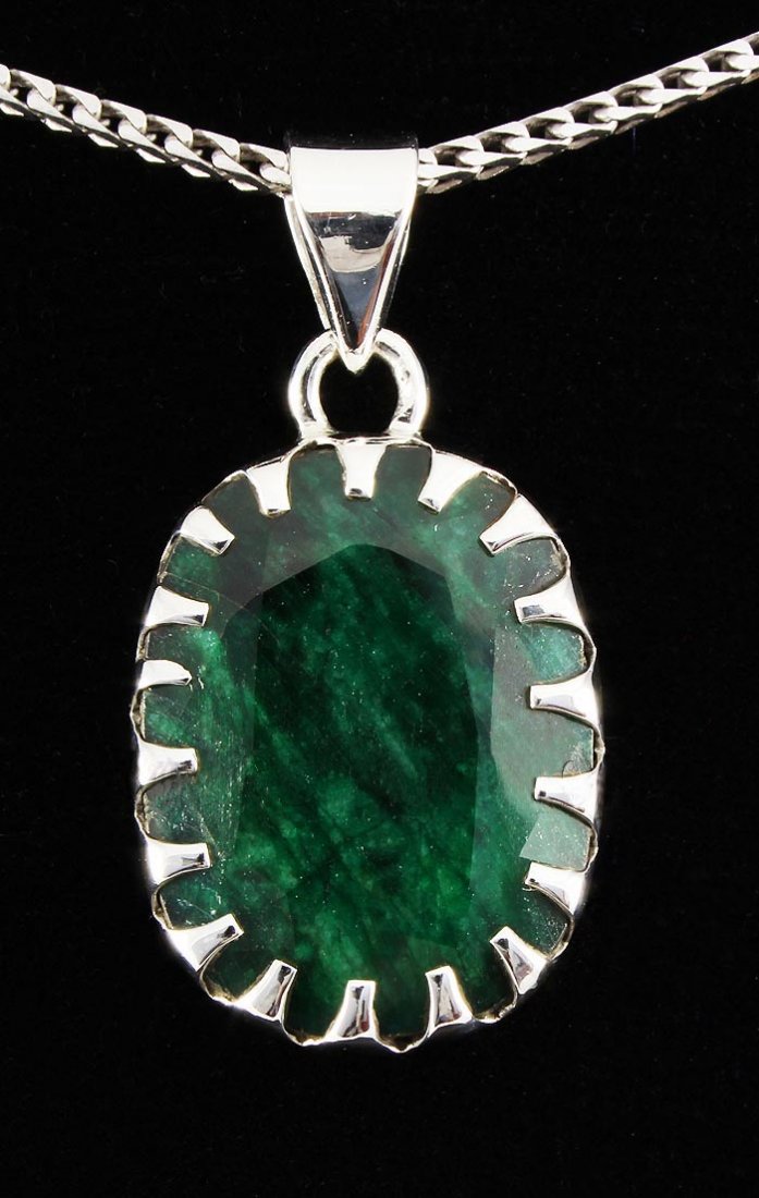 NATURAL EMERALD BERYL 27.40CTW SILVER PENDANT: NATURAL EMERALD BERYL 27.40CTW SILVER PENDANT **|**|** STERLING SILVER OVAL PENDANT WITH 20X15MM APPROX EMERALD BERYL GEMSTONE ; MSRP: $100