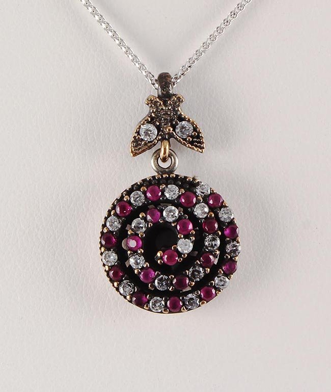Natural Stone Vintage Victorian Design Pendant: Natural Stone Vintage Victorian Design Pendant **|**|** 4.08g Natural Stone Ruby Spiral Victorian Design Pendant w/ cz diamonds; stamp 925 ; MSRP: $0