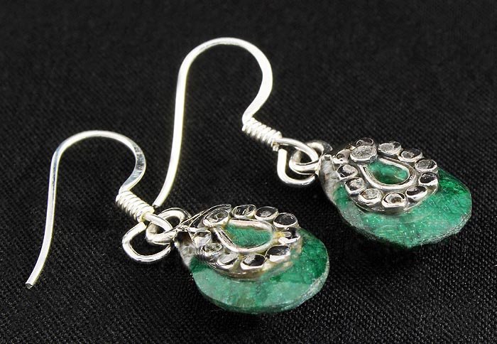 EMERALD BERYL 23.76CTW SILVER HOOK EARRING: EMERALD BERYL 23.76CTW SILVER HOOK EARRING **|**|** STERLING SILVER OVAL EARRING WITH 12X10MM APPROX EMERALD BERYL GEMSTONE ; MSRP: $100