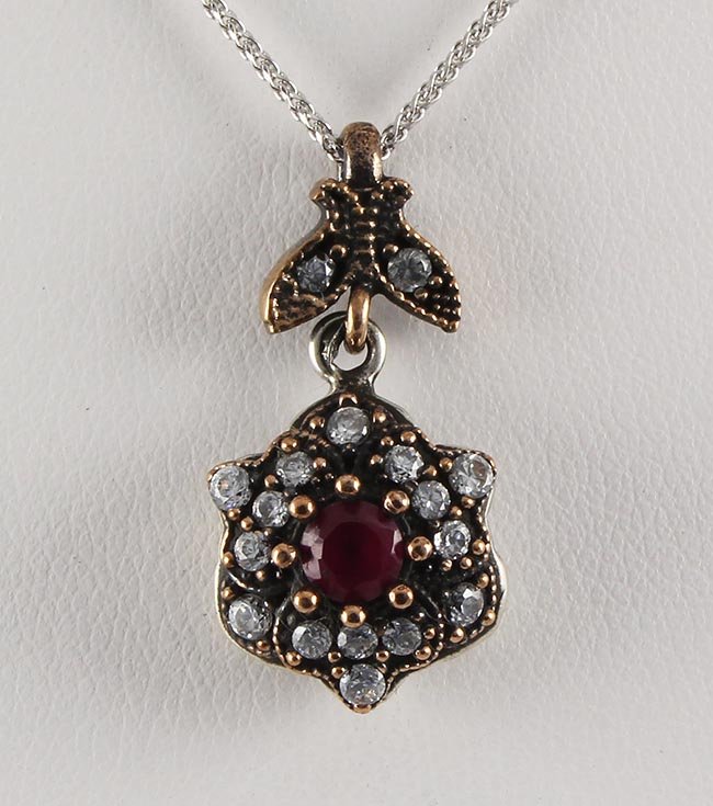 Natural Stone Vintage Victorian Design Pendant: Natural Stone Vintage Victorian Design Pendant **|**|** 3.85g Natural Stone 4.5MM Ruby Victorian Design Pendant w/ cz diamonds; stamp 925 ; MSRP: $0