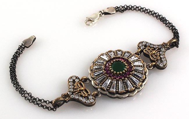Natural Stone Unrivaled Victorian Design Bracelet: Natural Stone Unrivaled Victorian Design Bracelet **|**|** 15.63g Natural Stone 7MM Emerald Beryl Center w/ Ruby and cz dia around in Victorian Design Bracelet; stamp 925 ; MSRP: $100
