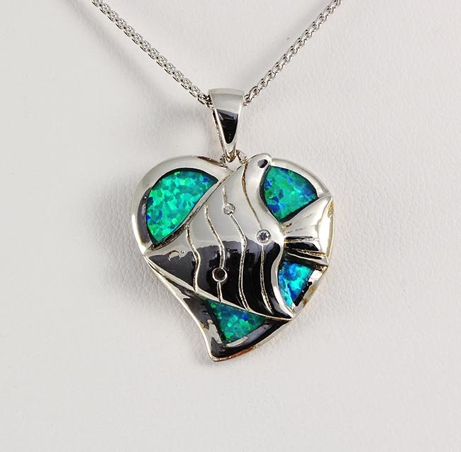 Natural Stone Opal Heart Design Pendant: Natural Stone Opal Heart Design Pendant **|**|** 4.10g Natural Stone Blue and Green Flashes Opal Fish Heart Design Pendant; stamp 925 ; MSRP: $100