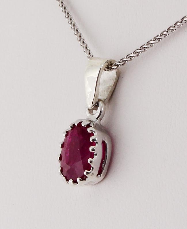 Sterling Silver Prong Set Pendant with Ruby Corrundum: Sterling Silver Prong Set Pendant with Ruby Corrundum **|**|** Oval Cut Ruby Corrundum Set in Sterling Silver Prong Pendant ; MSRP: $0