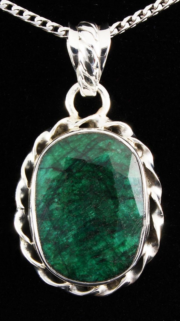 NATURAL EMERALD BERYL 35.83CTW SILVER PENDANT: NATURAL EMERALD BERYL 35.83CTW SILVER PENDANT **|**|** STERLING SILVER OVAL PENDANT WITH 19X14MM APPROX EMERALD BERYL GEMSTONE ;