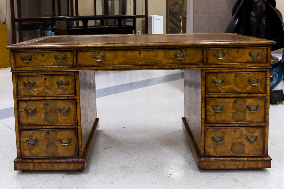 19th C. Oyster Walnut Veneer Partner's Desk.: 19th C. Oyster veneer walnut partner's desk with leather inset top. Double pedestal desk with 9 drawers on one side and 3 drawers, 2 doors on the other. (Approx. 32" tall, 62" x 26 1/2").