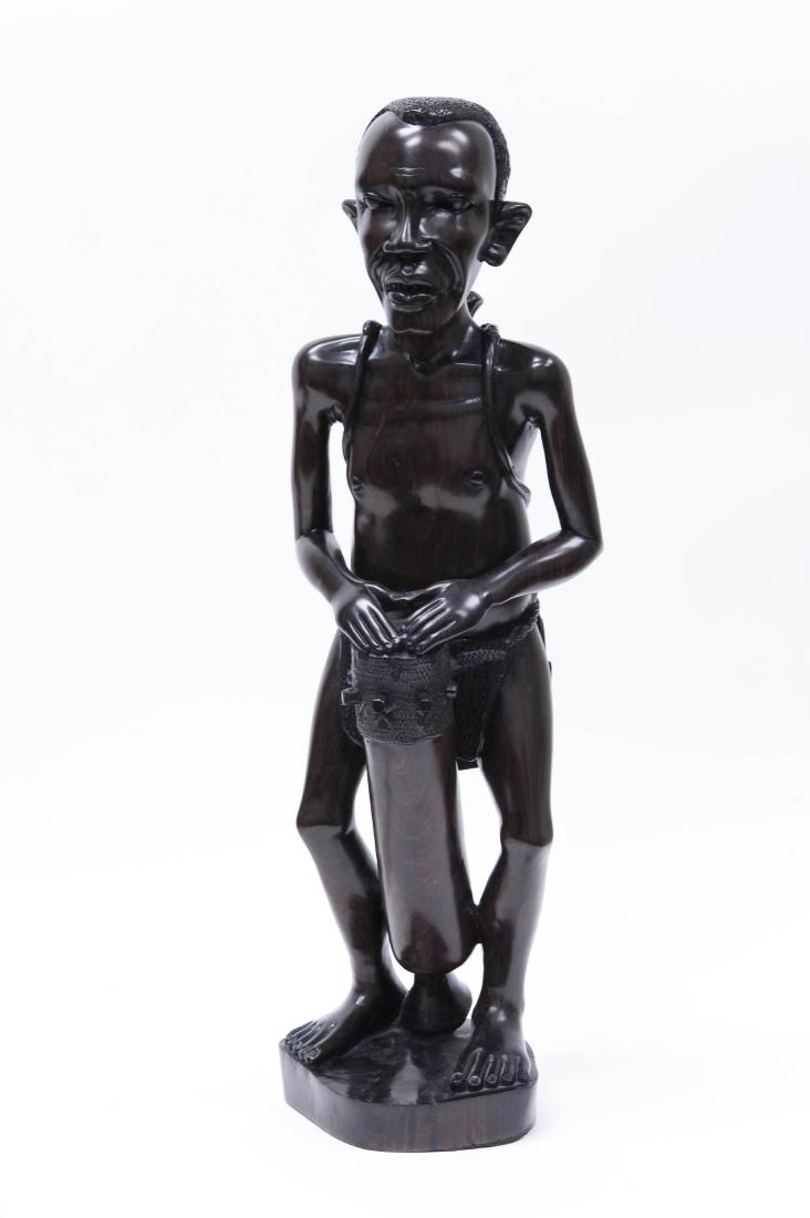 African Carved Wood Sculpture, Man with Drums. (1 of 4)