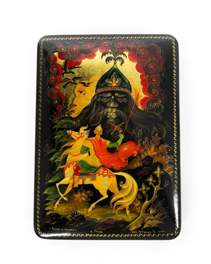 Kholui Russian Lacquer Box.: Kholui Russian lacquer box, Ruslan and the Head. Hinge lidded box. Signed, dated 1992. (1 3/8", 5 1/4" x 3 3/4").