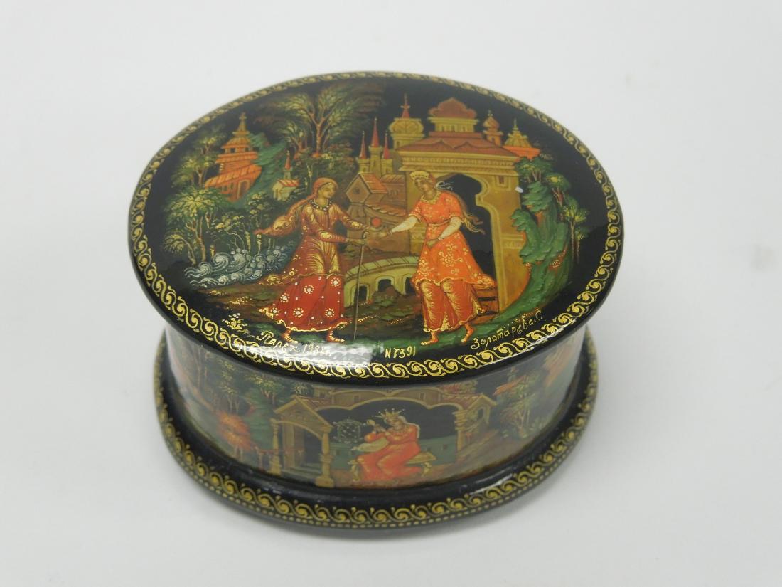 Zolotareva Palekh Russian Lacquer Box.: Zolotareva Palekh Russian lacquer box. Princess and 7 Bogatyrs. Oval box with lid and sides depicting fairy tale. Signed, dated 1988. N7391. (1 1/2 tall, 2 3/8" x 1 7/8").