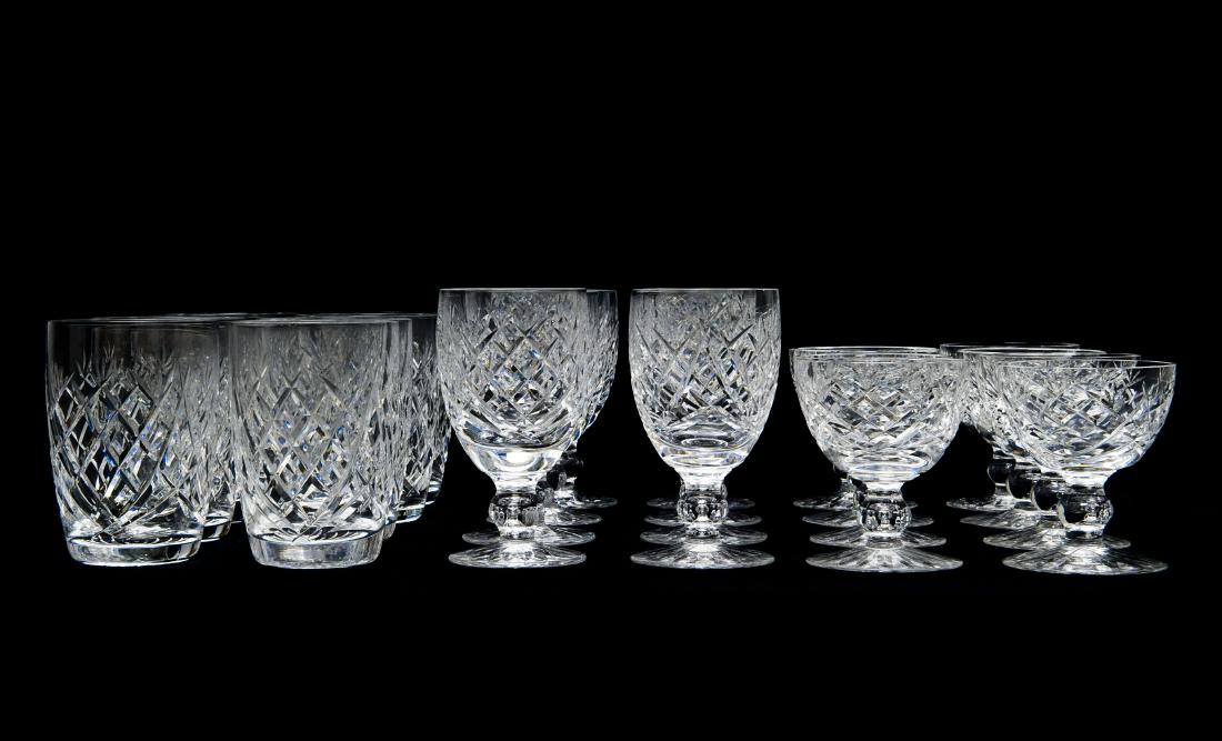 Group of Waterford Crystal Glasses.: Group of Waterford crystal glasses. 8 each of water glasses, wine and sherry glasses. (4 1/4, 4 3/4" & 3 1/2 inches tall).