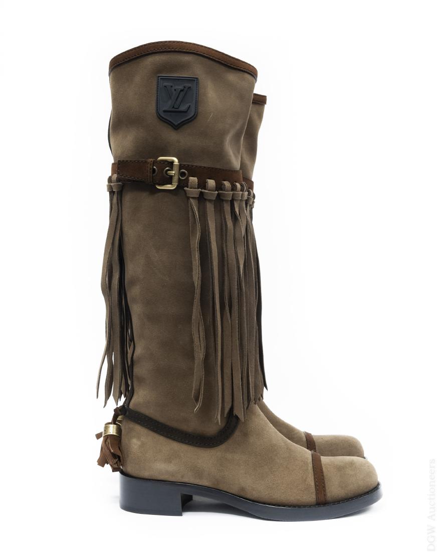 Pair of Louis Vuitton Boots.: Pair of lady's Louis Vuitton high suede fringe boots with buckle and tassel embellishments. (MA0150). Leather-lined. Size 38. With original box, zippered nylon bag and two cloth bags. Payment for t