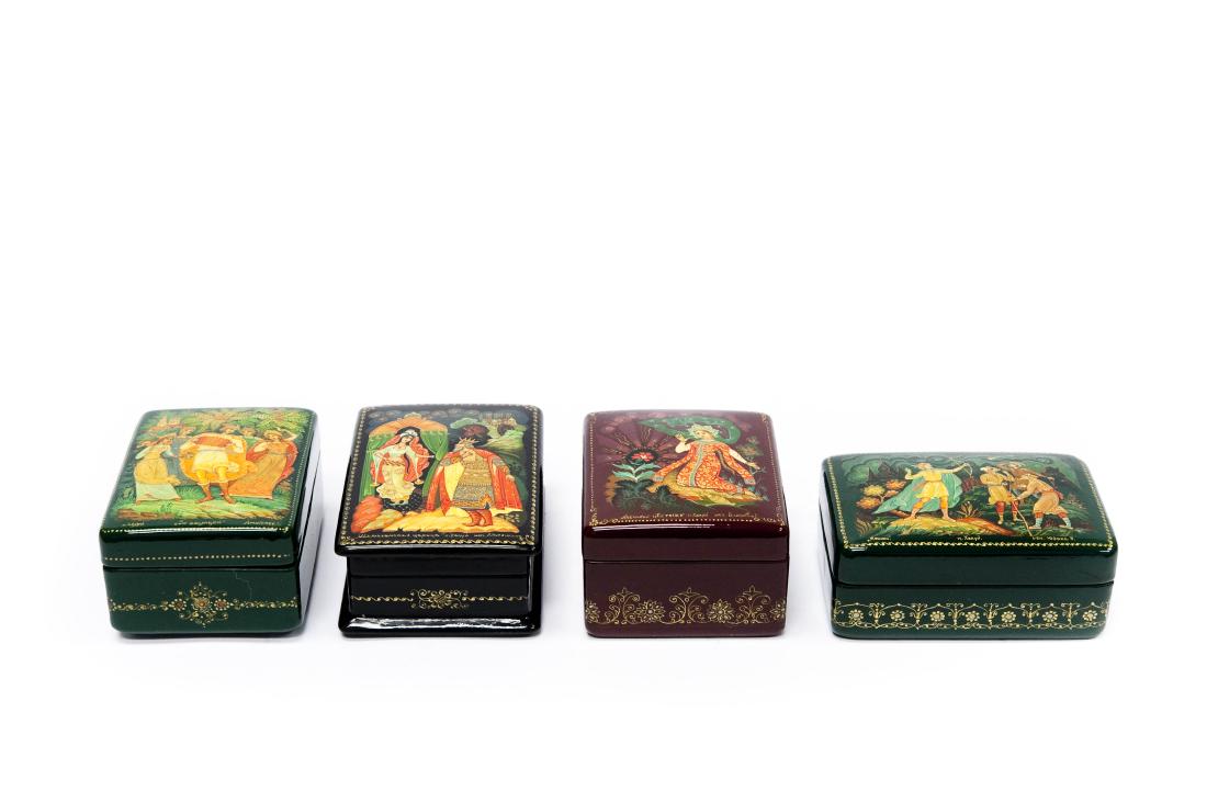 (4) Kholui Russian Lacquer Miniature Boxes.: (4) Kholui Russian lacquer miniature boxes. Rectangular boxes, signed and titled.