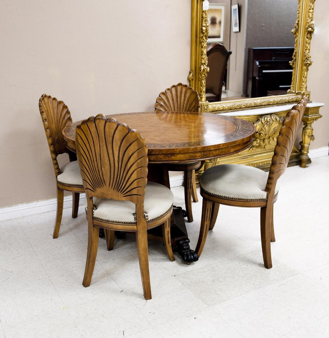 Baker Pedestal Table and Set of Four Chairs.: Baker Furniture Continental Empire style pedestal table. Burl veneers, the circular top with marquetry floral border, on tripartite pedestal with scroll and paw feet. Together with a Brueners set of f