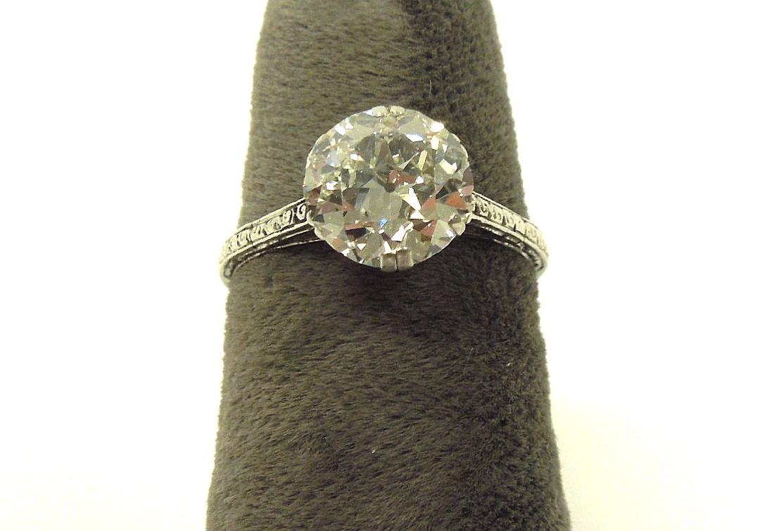 Platinum & Diamond Solitaire Ring.: Platinum and Diamond solitaire ring. Old European diamond. 1.64 cts, VS clarity, H color, Good cut grade. 7.60 x 7.80 x 4.12 mm approximately, Depth: 53.5%, Table: 57.1%, Girdle: Very thin to thin, Cu