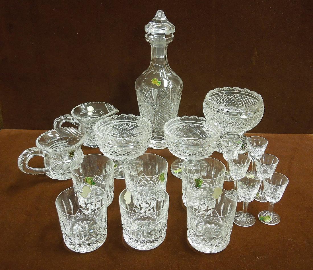 Group of Waterford Crystal Tableware.: Group of Waterford crystal tableware. Decanter, candy jar, 2 bowls, 2 creamers, 6 whiskey tumblers and 6 liqueur glasses.