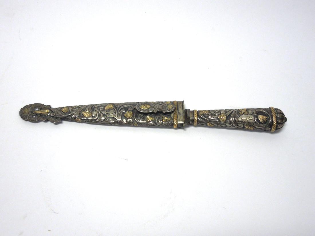 Movediza Dagger with 18K Gold and Silver Sheath.: Movediza Argentina dagger with 18K gold and 800 silver floral decorated sheath and handle. (6 1/2 inch blade, 11 1/2 inches overall).