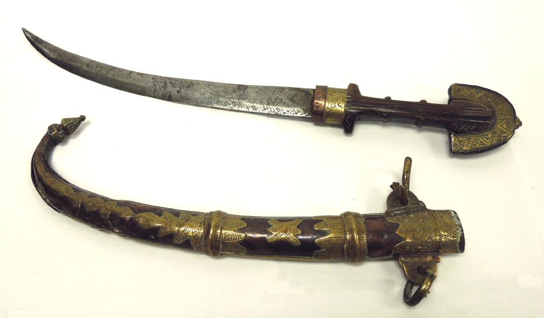 North African Koummya Dagger.: North African Koummya dagger. Likely Moroccan, the Koummya dagger is traditional to the Berber and Arabic people of Morocco. Curved double edged blade, wooden hilt with the traditional peacock pommel 