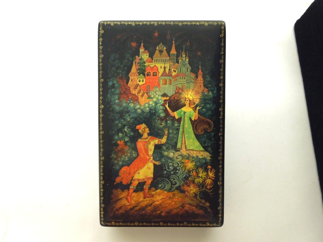 Zhivnostka Kholui Russian Lacquer Box.: Zhivnostka Kholui Russian lacquer box. Removable lid box, titled and signed. (7 3/4 x 4 3/4 x 1 1/2 inches).