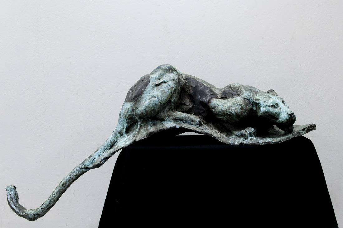 Dylan Lewis Bronze Leopard.: Dylan Lewis (South African, b. 1964), Bronze life size sculpture of a leopard crouched, drinking from a pond. Incised signature Dylan Lewis, dated '96, numbered 7/8. (66 x 31 1/2 x 22 inches).