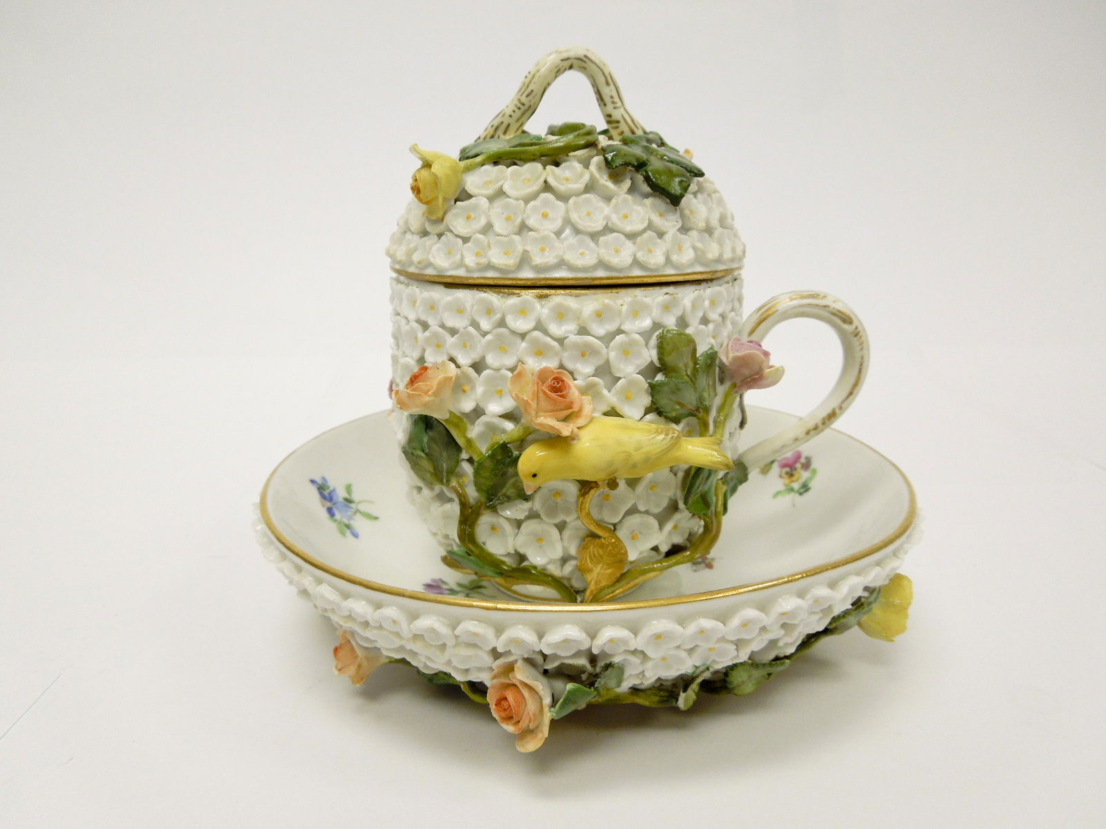 Meissen Schneeballen Cup and Saucer Set.: Meissen Schneeballen covered cup and saucer set. Blue cross swords mark on the cup and saucer. On (4 3/4" tall overall).