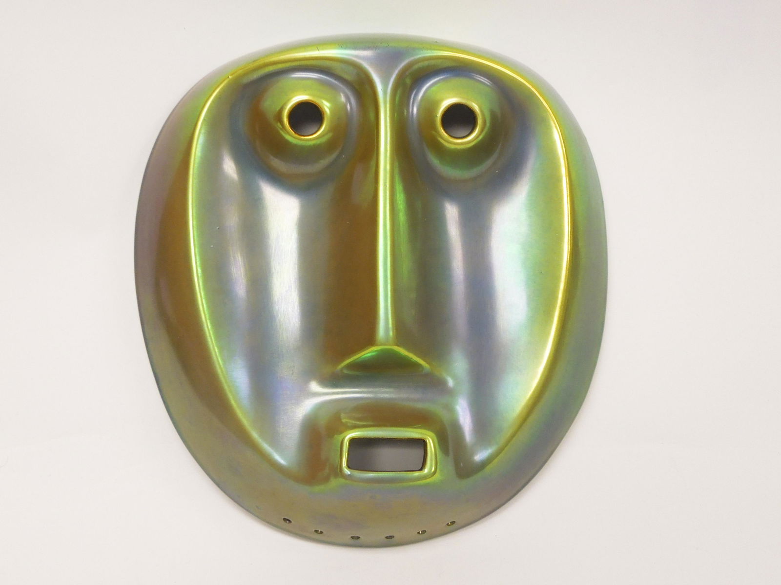 Zsolnay Hungary Antal Gazder Mask.: Zsolnay Hungary, Antal Gazder Eosin mask. Green luster mask with Zsolnay mark. (8 1/4 x 7 1/2 inches).