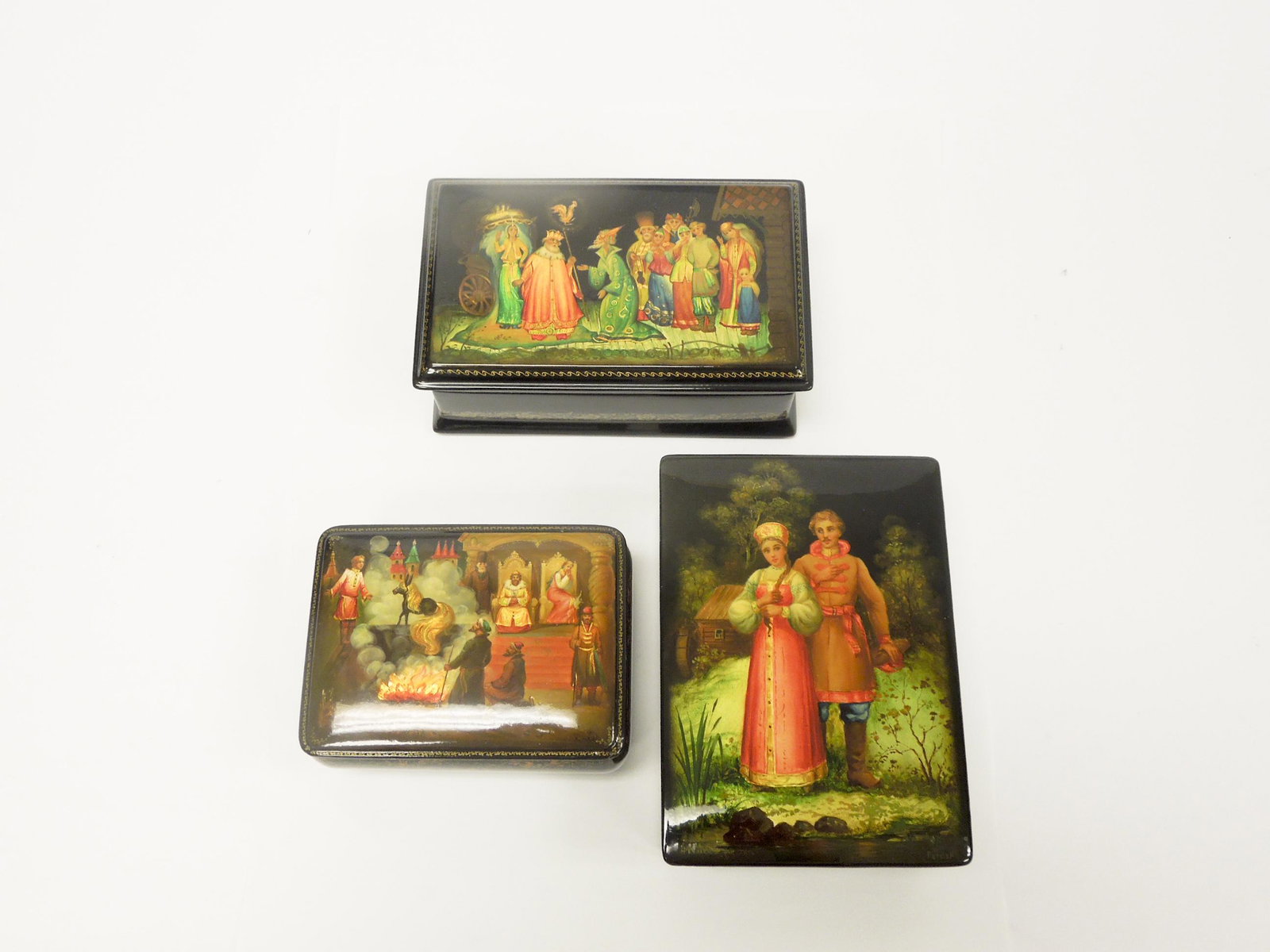 (3) Fedoskino Russian Lacquer Boxes.: (3) Fedoskino Russian lacquer boxes. Golden Cockerel, Magic Pony & Young Couple. Signed and dated. (6 x 4, 5 x 3.5 & 6.5 x 4 inches).