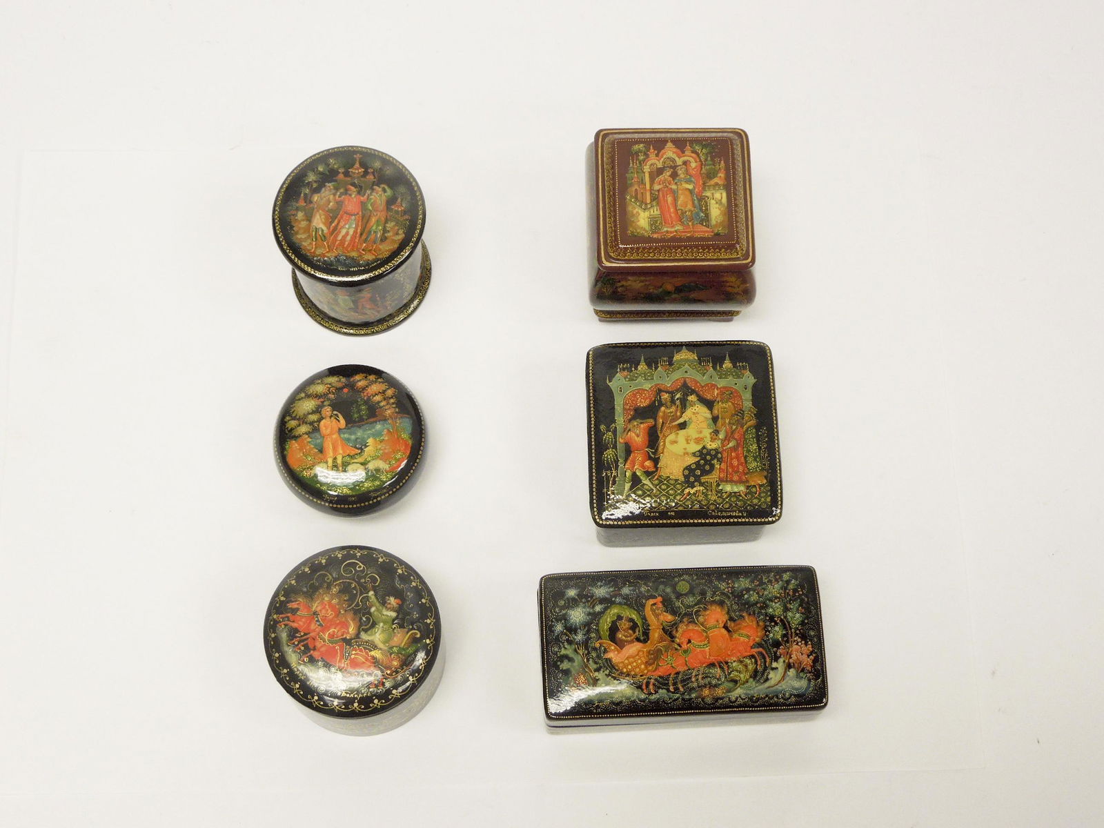 (6) Palekh Russian Lacquer Boxes.: (6) Palekh Russian lacquer boxes. Signed. (2 x 2 x 3 to 1 1/4 x 1 1/4 x 1 1/4 inches).
