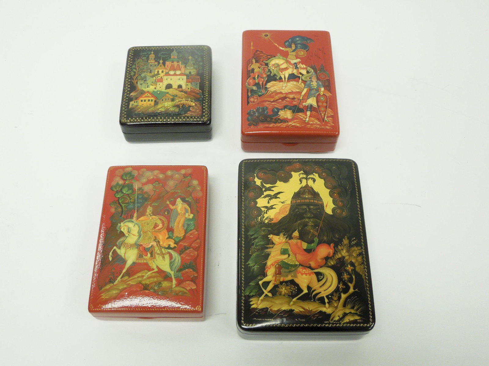 (4) Mstera Russian Lacquer Boxes.: (4) Mstera Russian lacquer boxes. Signed rectangular boxes including Bragin, Kokanenko Muratova. (5 3/8 x 3 3/4 to 3 1/2 x 3).