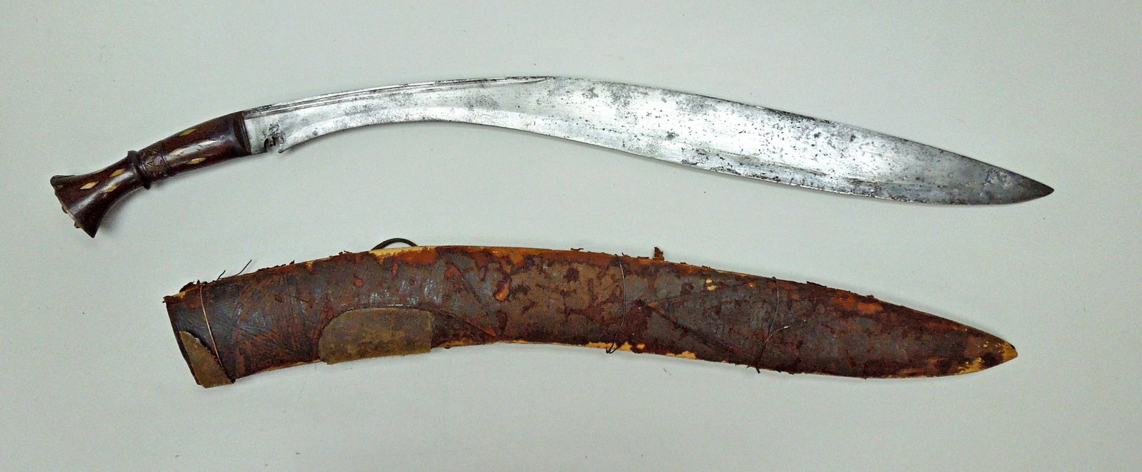Large Nepalese Khukri, Late 19th / Early 20th C.: Large Nepalese Khukri (Knife), late 19th / early 20th C. 26 inch blade. Wood handle with bone inlays.
