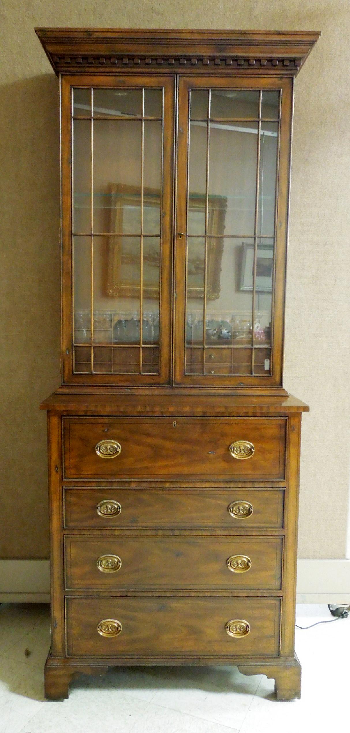 Maitland-Smith Secretary Bookcase.: Maitland-Smith secretary bookcase. Top section with 2 glass doors and cubby hole interior and lower section with drop front and 3 drawers.