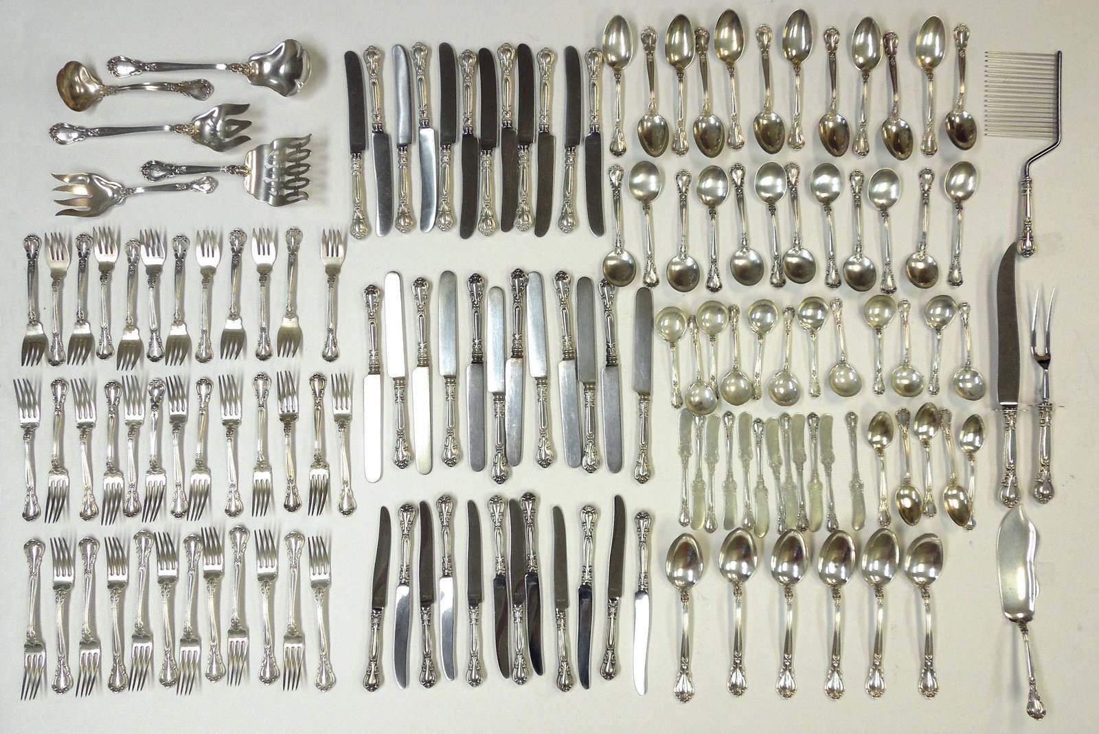 Gorham Sterling Silver Flatware Service, 140 pieces.: Gorham Sterling Silver flatware service, Chantilly pattern, 140 pieces. 138.88 troy oz excluding 3 sets of knives and cake breaker. Monogrammed. (12 dinner forks, 13 luncheon forks, 12 salad forks, 12