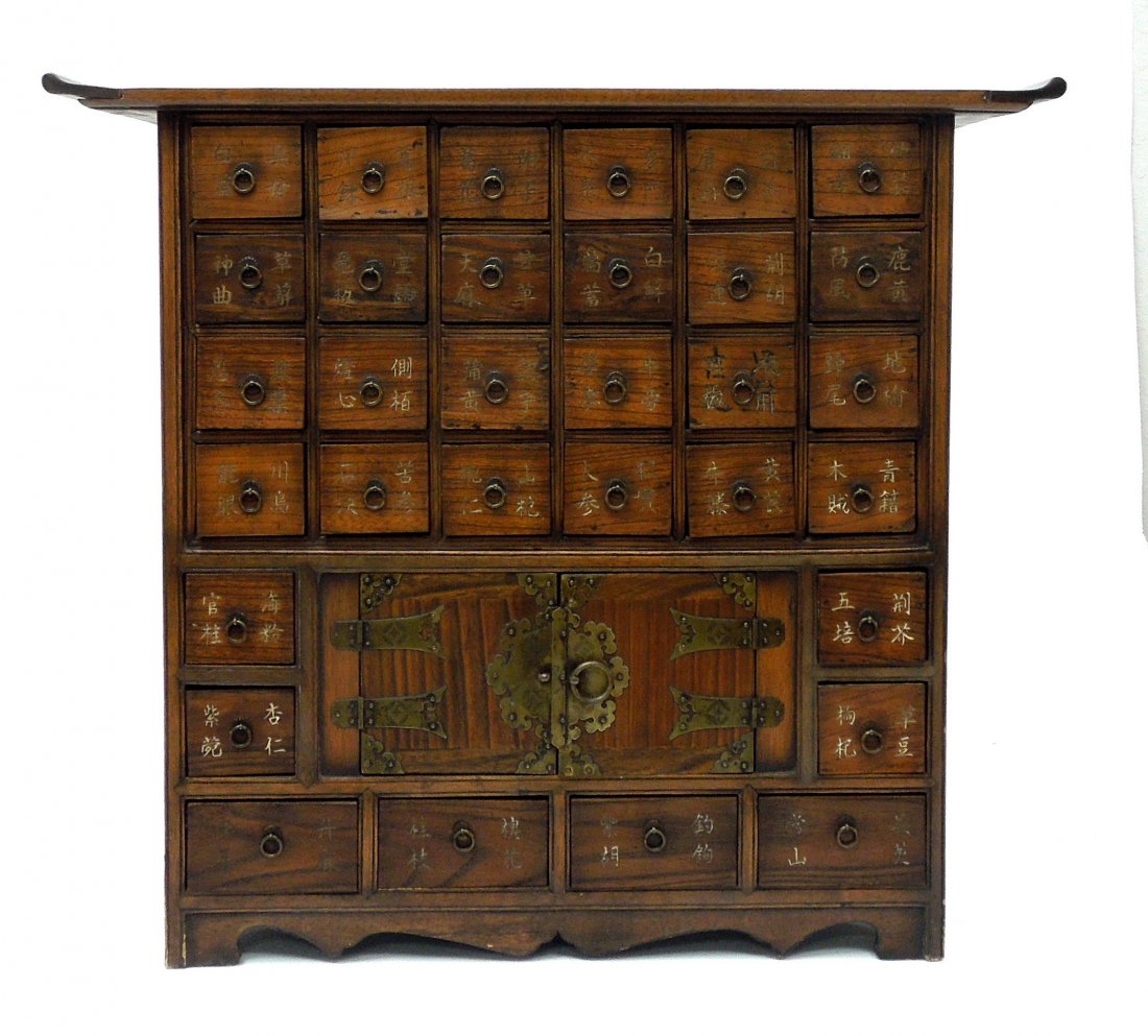 Early 20th C. Chinese Apothecary Cabinet.: Early 20th C. Chinese Apothecary cabinet. Diminutive cabinet with 32-drawers and 2 doors. 32 1/4" L, 12" D, 29" H.