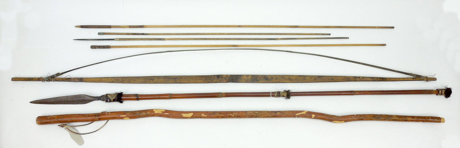 Bow and Group of African Tribal Spears.: Group of (5) tribal spears and a bow.